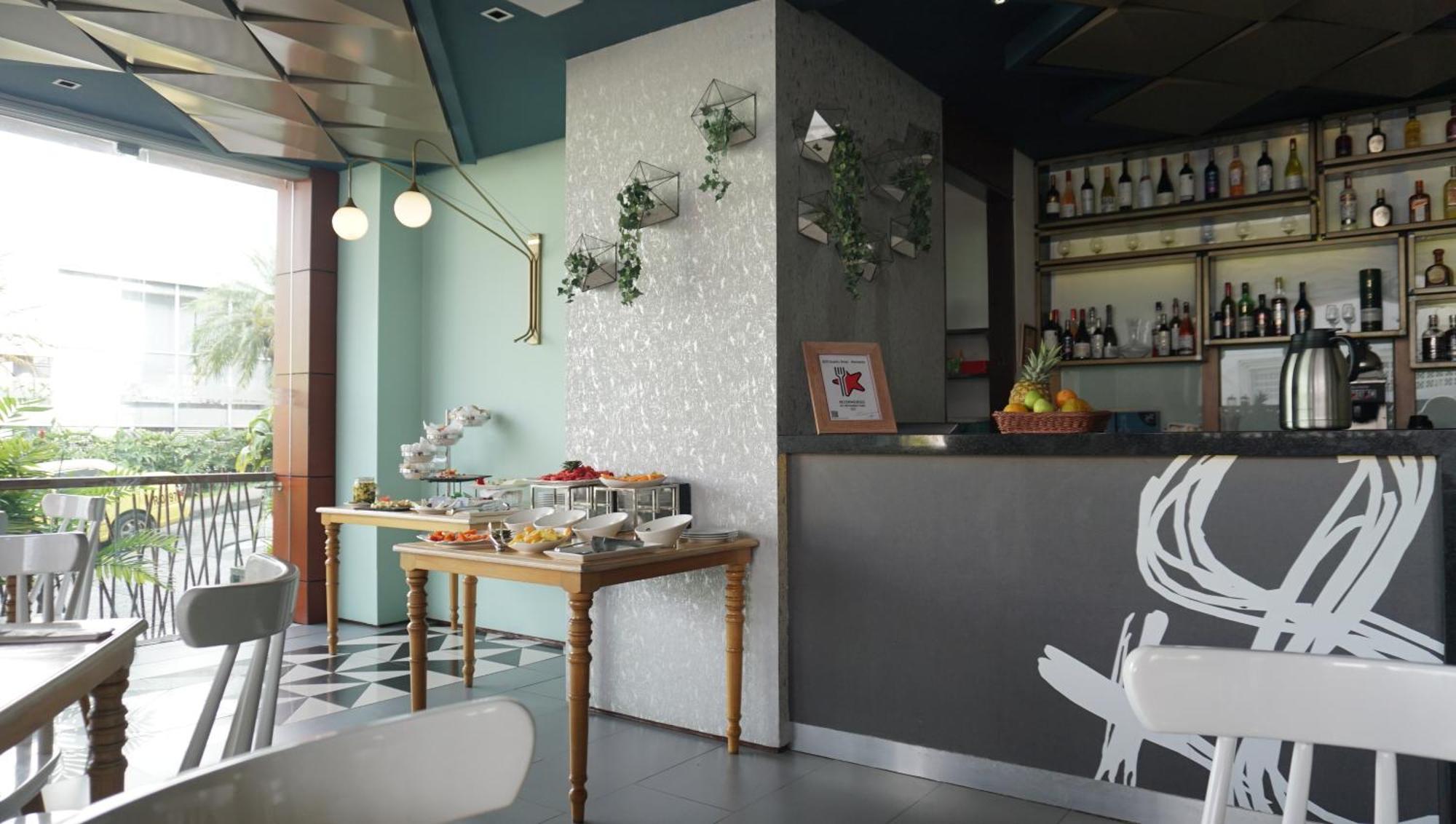 Quo Quality Hotel Manizales Εξωτερικό φωτογραφία The interior of the restaurant