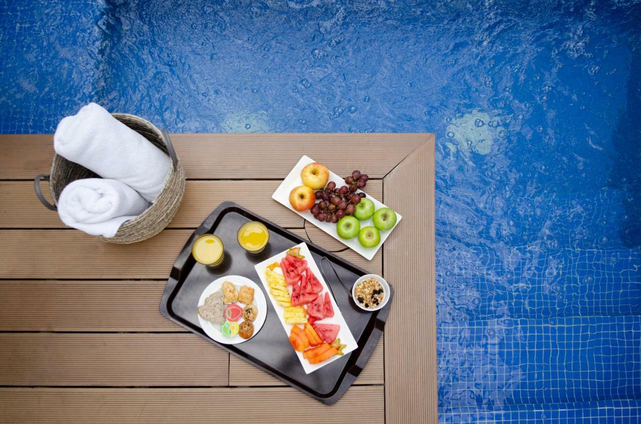 Quo Quality Hotel Manizales Εξωτερικό φωτογραφία A poolside snack